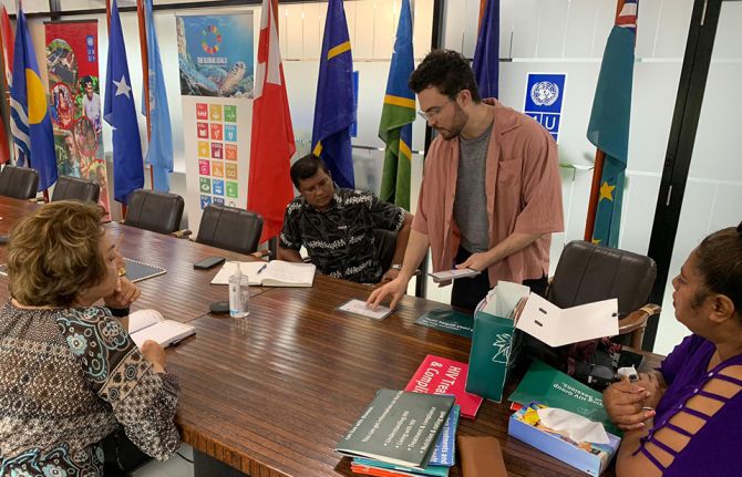 Dean Cassano (standing) Burnet Institute Senior international Health Project Officer