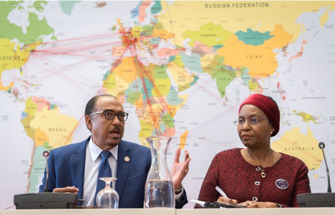 Photo: Albin Hillert/WCC. 21 February 2019, Geneva, Switzerland: UNAIDS Executive Director Michel Sidibé visits the Ecumenical Centre in Geneva, received by World Council of Churches deputy general secretary Isabel Apawo Phiri.